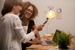 2 woman working in an office