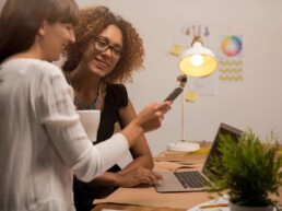 2 woman working in an office
