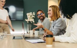 Woman smiling in a meeting