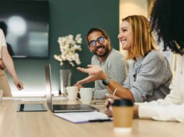 Woman smiling in a meeting