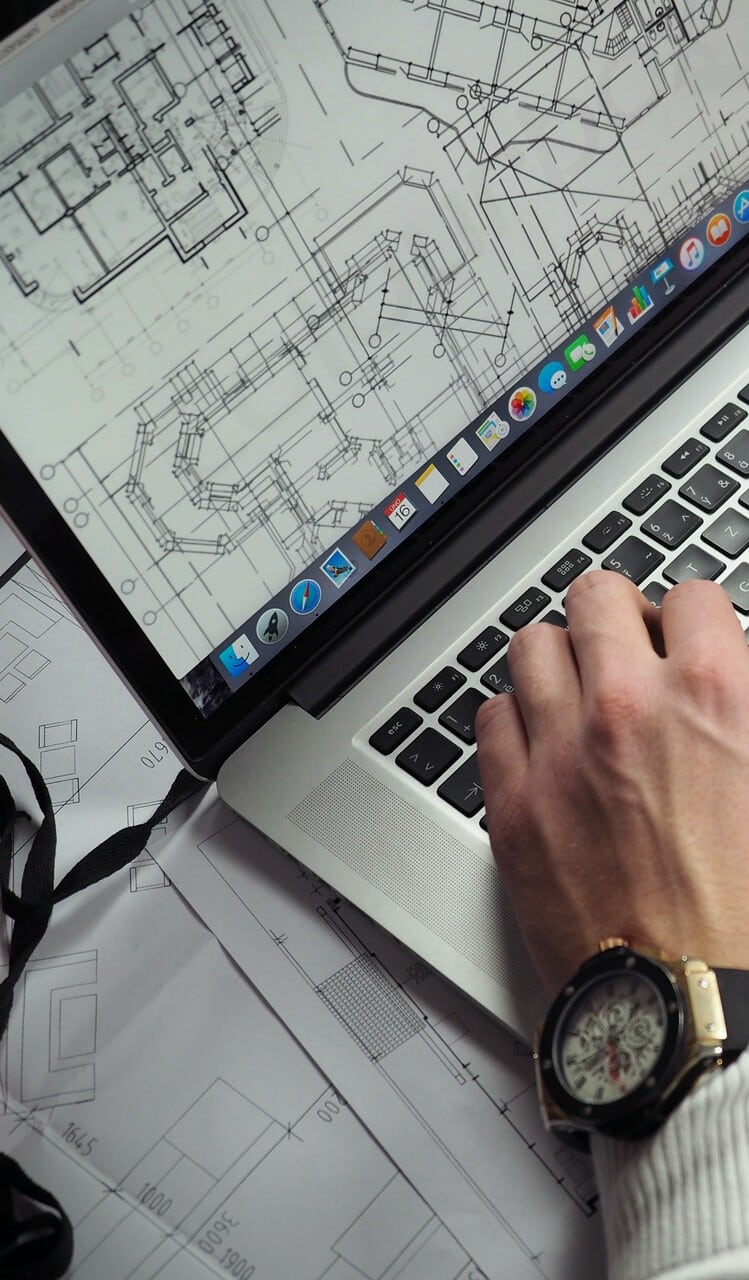 Man looking at construction plans