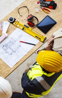 Man looking at construction plans